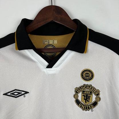 Camisa Dupla Face Retrô Manchester United 2001/02 100 Anos Masculina Branca e Preta ou Dourada