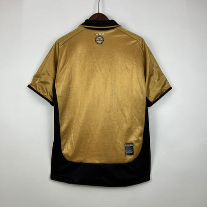 Camisa Dupla Face Retrô Manchester United 2001/02 100 Anos Masculina Branca e Preta ou Dourada