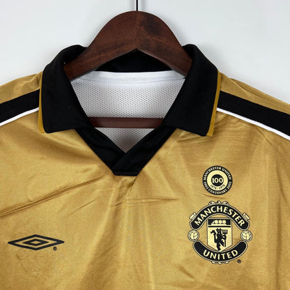 Camisa Dupla Face Retrô Manchester United 2001/02 100 Anos Masculina Branca e Preta ou Dourada